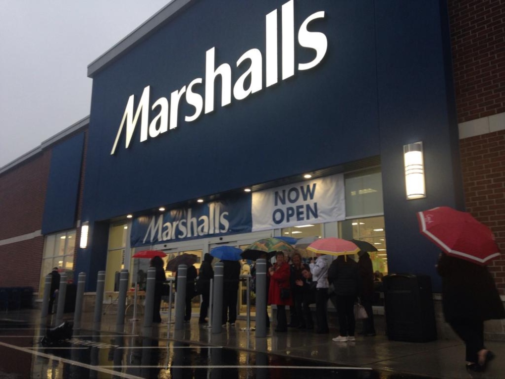 Dedicated shoppers line up in the rain as Marshalls opens its doors for the first time in Windsor. (Chris Campbell / CTV Windsor)