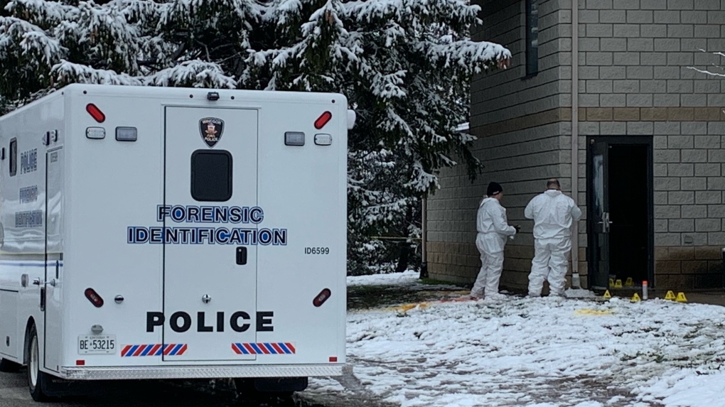 Windsor police and forensic unit on scene of an active investigation at the Lexington Hotel in Windsor, Ont. on Sunday, Nov. 28, 2021. (Chris Campbell/CTV Windsor)