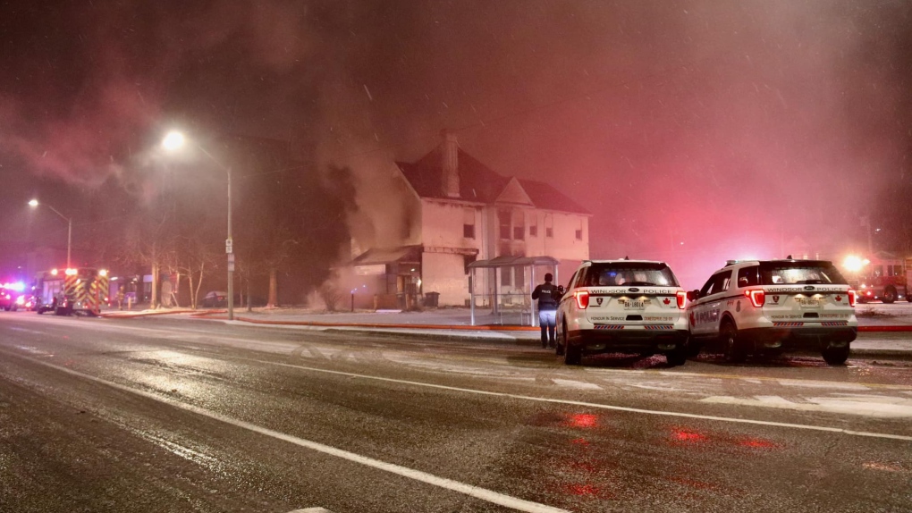 Emergency crews battle a blaze in the 800 block of Ouellette Ave. Jan 1, 2022. (Source: @_OnLocation_ / Twitter)