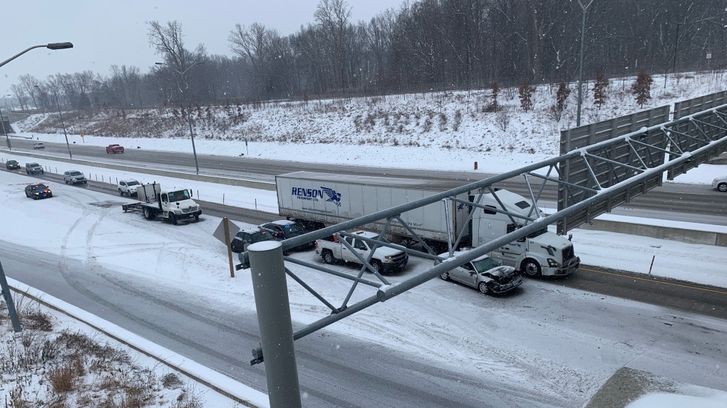 Police responded to a two-vehicle crash involving a tractor trailer and passenger vehicle on Highway 401 in Windsor, Ont. on Monday, Jan 24, 2022. (Rich Garton/CTV Windsor)
