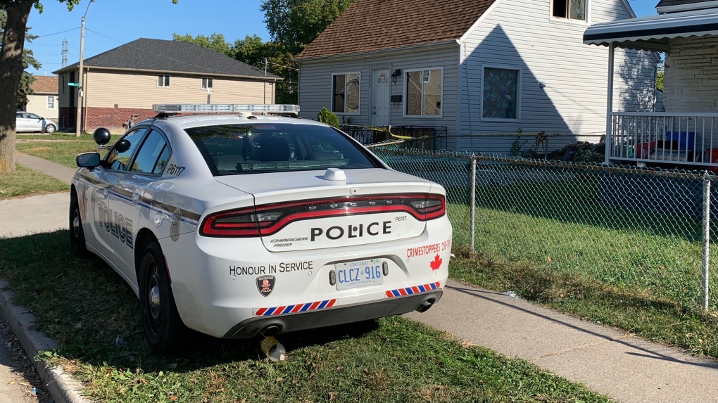 Windsor police on scene of a house fire on California Avenue in Windsor, Ont. on Sunday, Oct. 2, 2022. (Chris Campbell/CTV News Windsor)