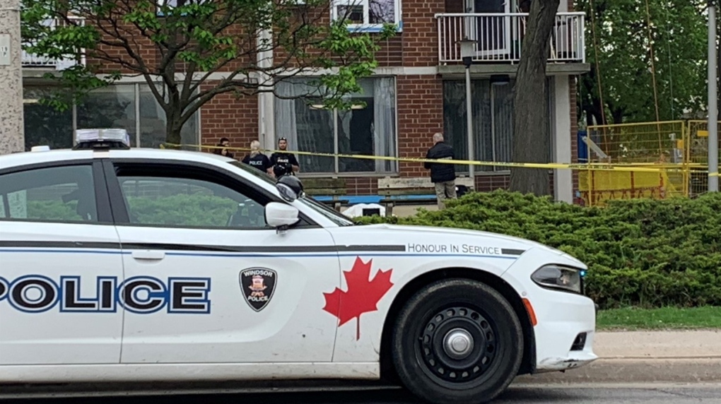 Windsor police have launched an investigation after a body was discovered outside an apartment building in Windsor, Ont., on Tuesday, May 10, 2022. (Bob Bellacicco/CTV News Windsor)