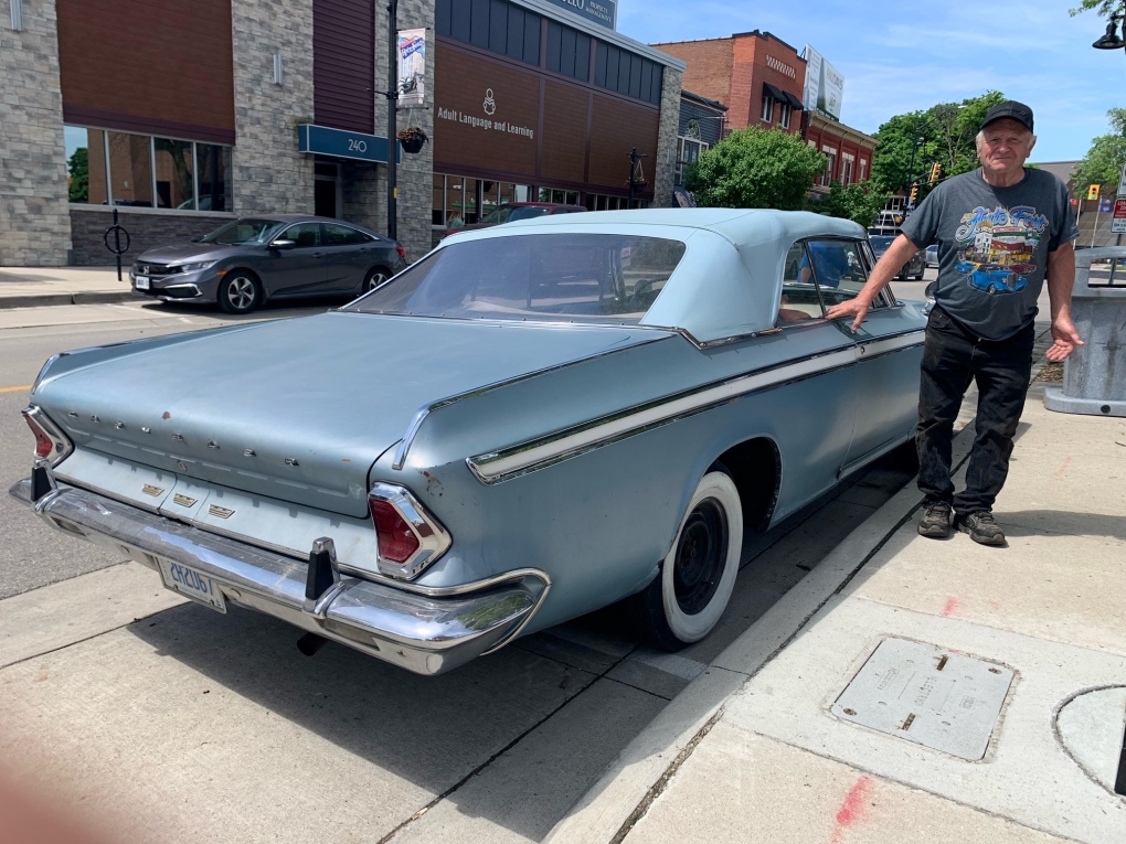 Ron Vandewynckel, vice-president of the Kent Historic Auto Club stands with his 1964 Chrysler convertible. (Chris Campbell/CTV News Windsor)
