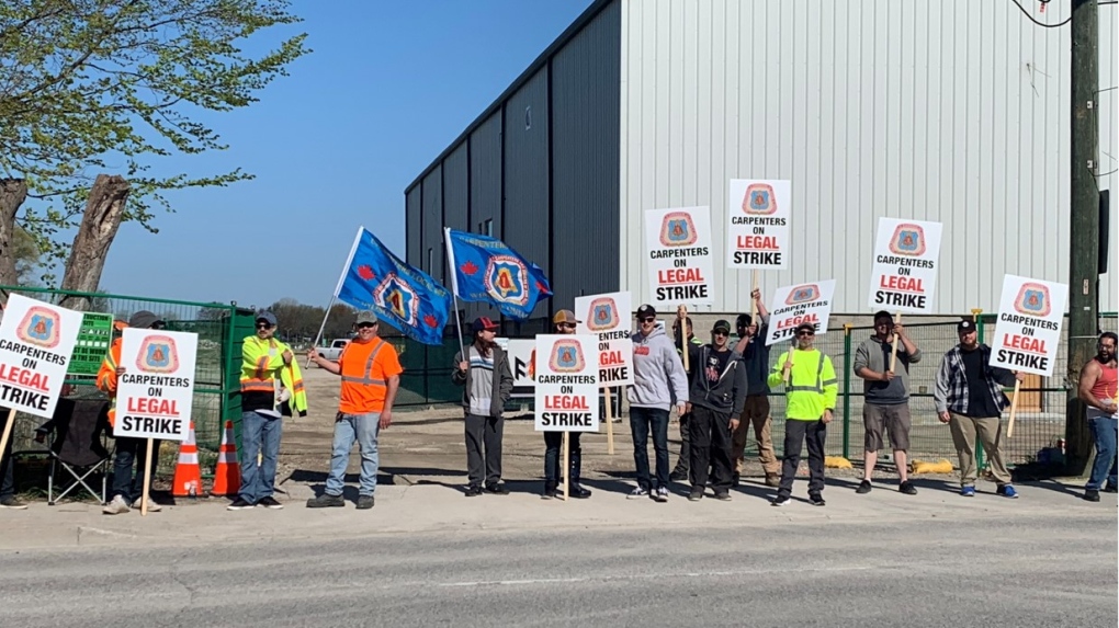 Picket lines went up at two construction sites in Windsor, Ont., on Monday, May 9, 2022. (Michelle Maluske / CTV Windsor)