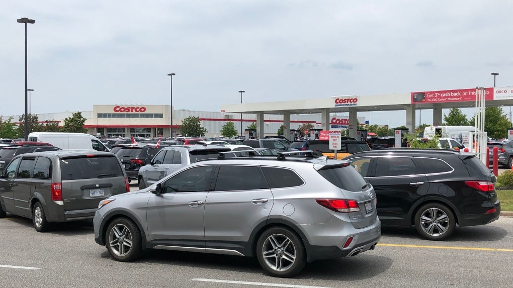 Drivers line up for gas at the Costco gas bar in Windsor, Ont., on Monday, July 4, 2022. (Gary Archibald/CTV News Windsor) 