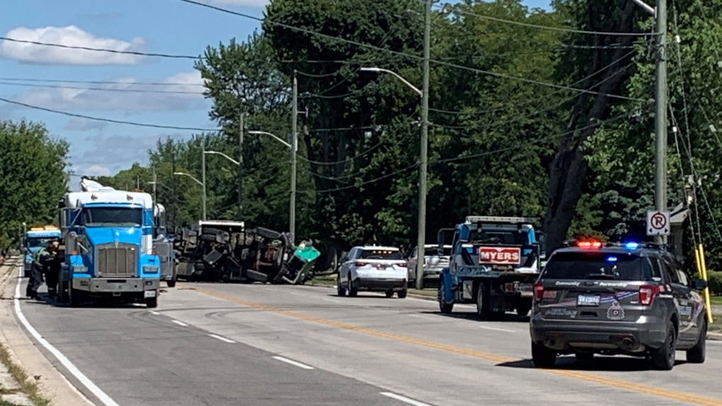 A truck flipped along Front Road after what appears to be a two-vehicle collision in LaSalle, Ont. on Tuesday, Aug. 2, 2022. (Taylor Choma/CTV News Windsor)