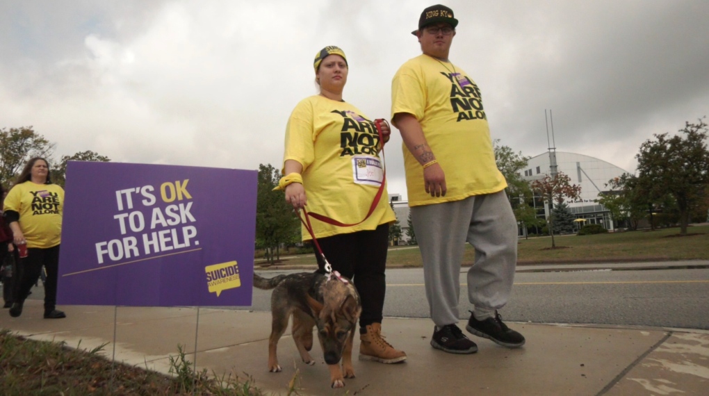 Walkers take a trip around the St. Clair College campus for the annual suicide prevention walk in Windsor, Ont. on September 25, 2022. (Rich Garton/CTV News Windsor)