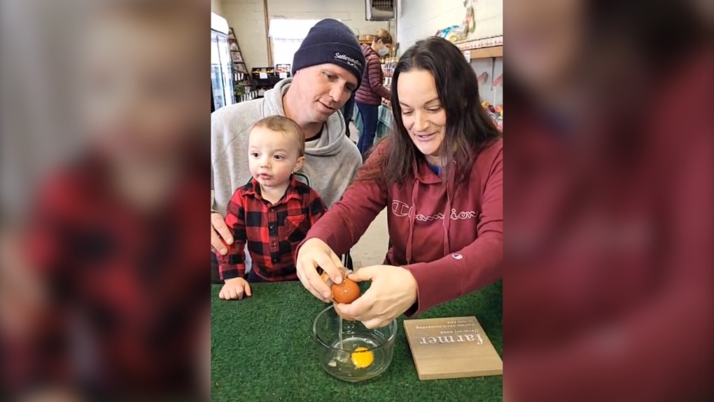Jason and Corrie Adamson cracked the giant egg on Wednesday, Jan. 26, 2023. (Source: Simpson Orchards/Facebook)