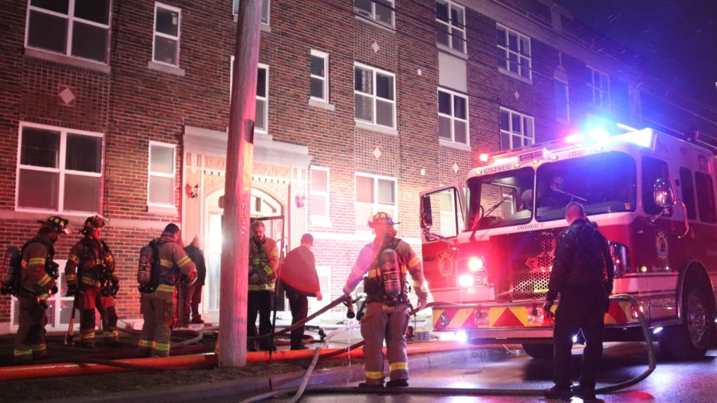 Fire crews on scene at a residential building on Assumption Street in Windsor on March 16, 2023. (Source: @_OnLocation_/Twitter)