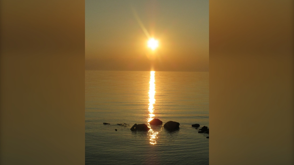 The sun sets over Lake St. Clair in Belle River, Ont. in this viewer-submitted image from June 2023. (Source: Pamela Young) 